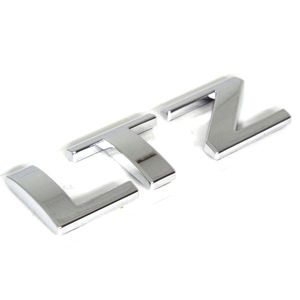 Emblema Lt Traseiro Da Tampa Onix 1.0 Turbo 1.0 Aspirado /tracker Turbo 1.2 Turbo pcd Peças Genuínas